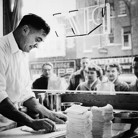 Sam Perrella preparing a pizza